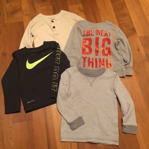 Four 2T long sleeve boy shirts